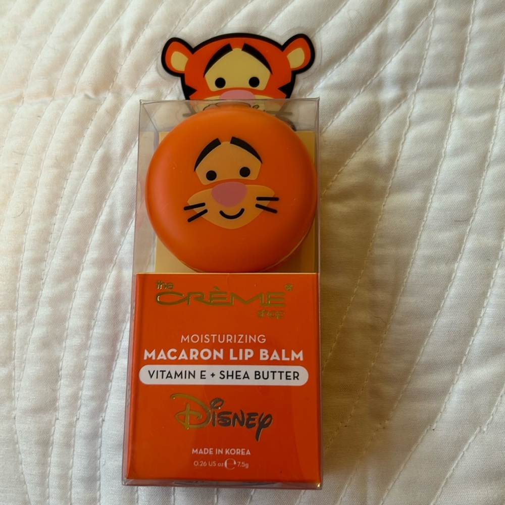 Disney’ Tiger macaron lip balm by the crème.